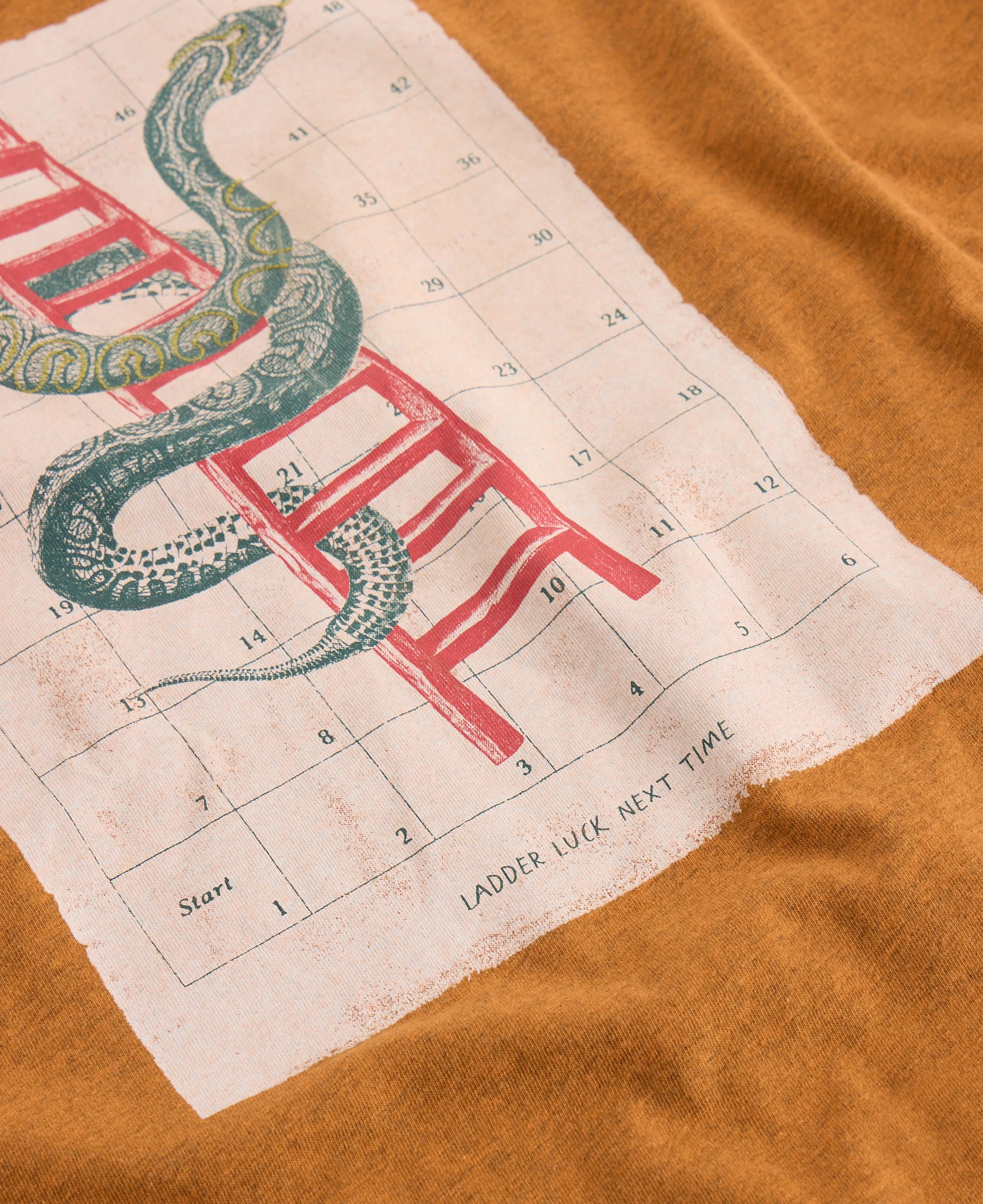 Abersoch Graphic Boardgame Tee - Orange Print - Image 6